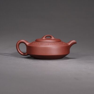 Man Sheng Flat Stone Teapot